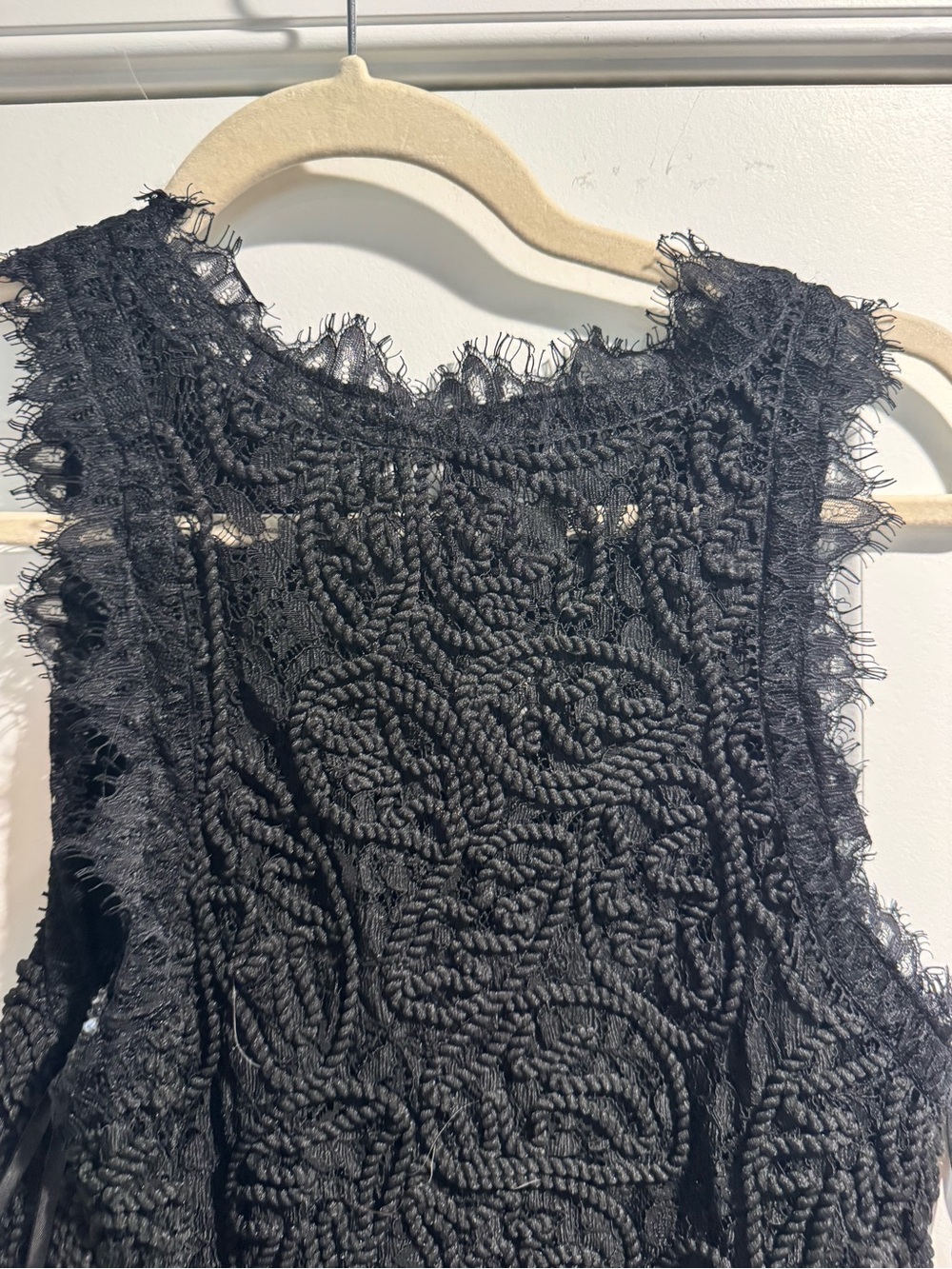 the clothing company Black Lace Crochet Mini Dress